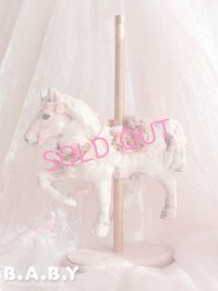 Petal Toss Carousel House